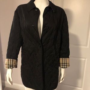 Black quilted Burberry coat